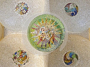 Ceiling with mosaic sun of Park Guell